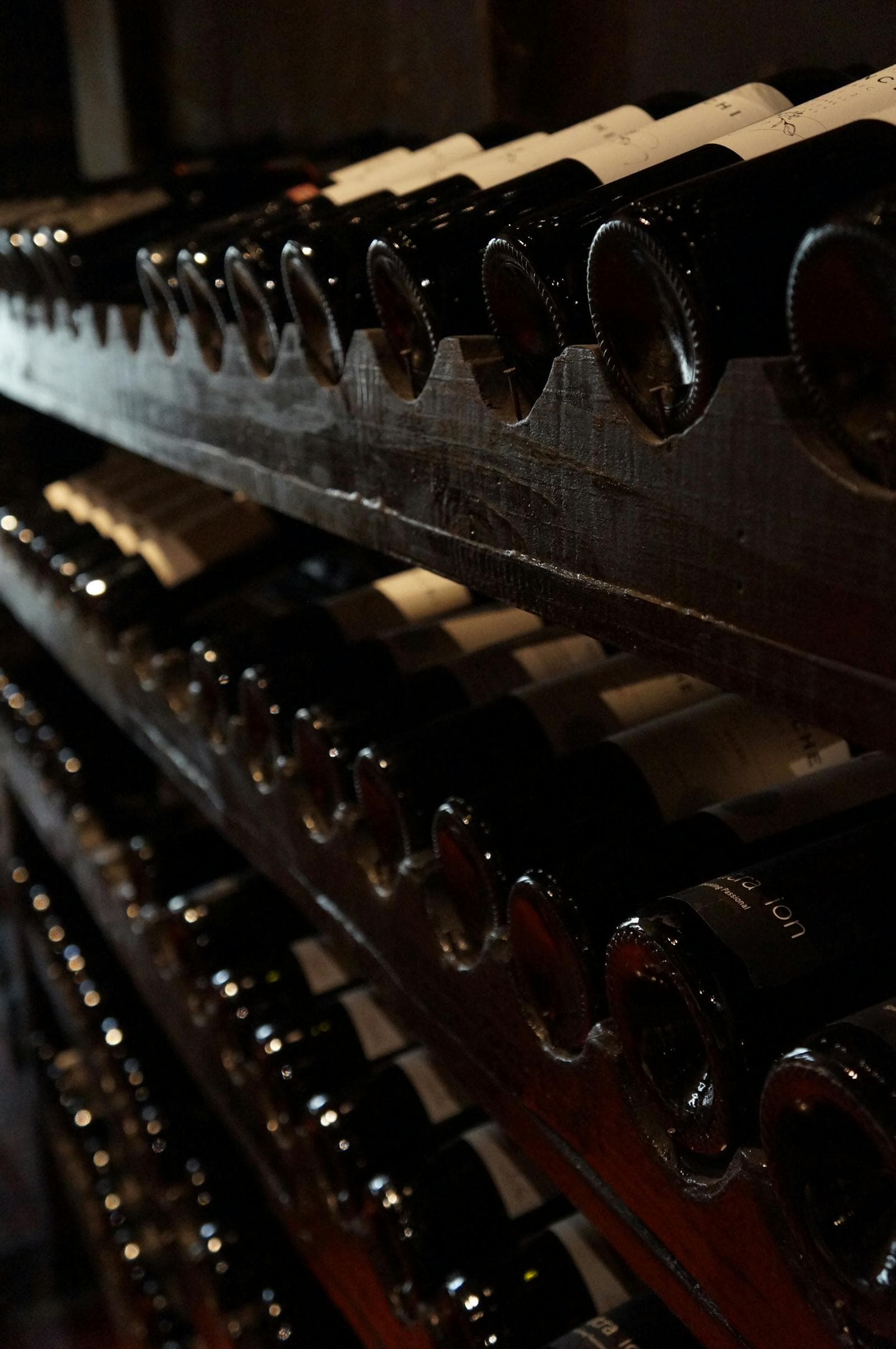 About winecellar.services — luxury home wine cellar with full-height wood racking